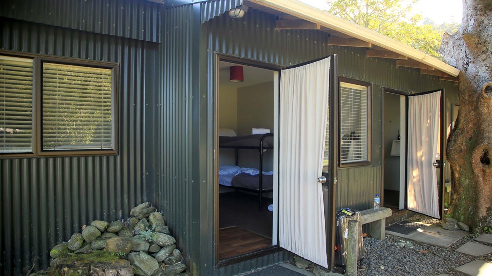 A Hiker's Bunk Cabin is one of the basic accommodation room options at Furneaux Lodge in the Marlborough Sounds at the top of New Zealand's South Island.