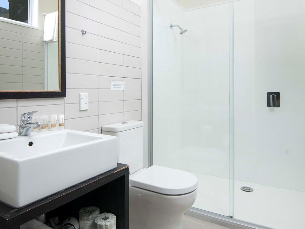 An Endeavour Suite ensuite has its own shower and toilet at Furneaux Lodge in the Marlborough Sounds at the top of New Zealand's South Island.