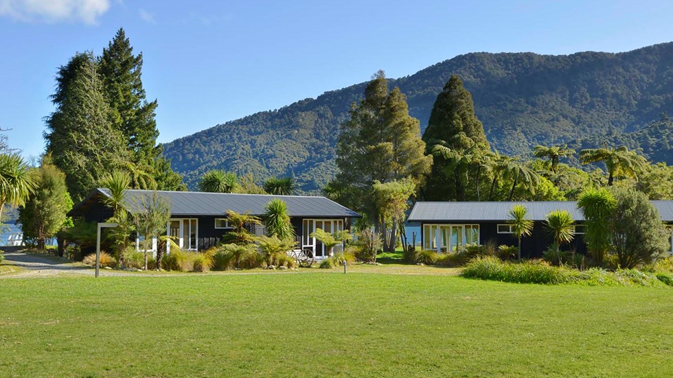 Endeavour Suites can be found close to the water and are surround by lush green native bush at Furneaux Lodge in the Marlborough Sounds at the top of New Zealand's South Island.